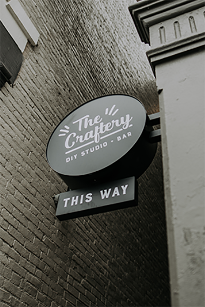 The Craftery Bar outdoor signage design by Brittney Gaddis Design